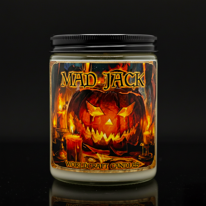 Fantasy pumpkin candle named Mad Jack staged on a black background